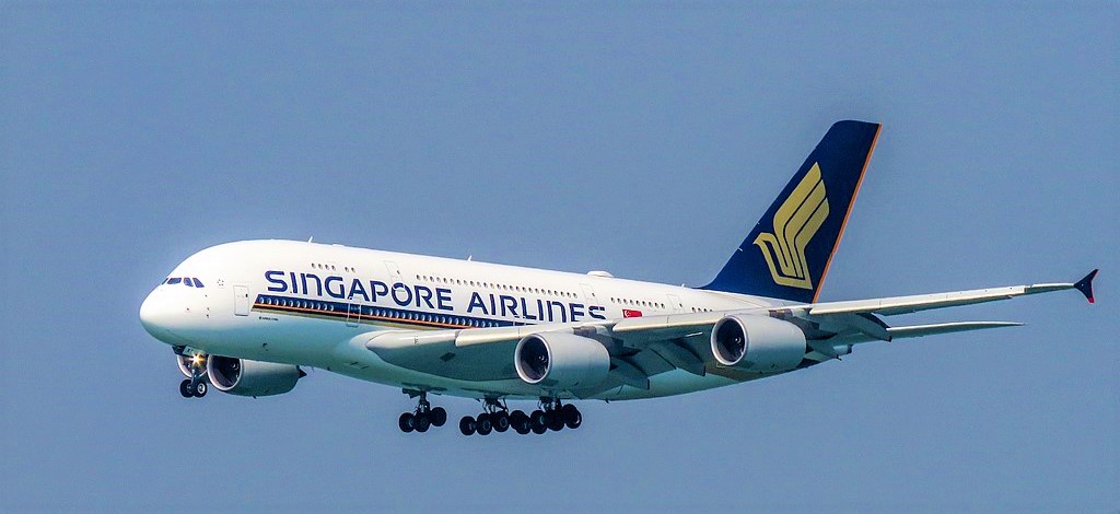 ATC said , turn right onto a heading of  270° ,  Cockpit  responded  with  turning  Left after missing  'Read Back' , caused a near miss !